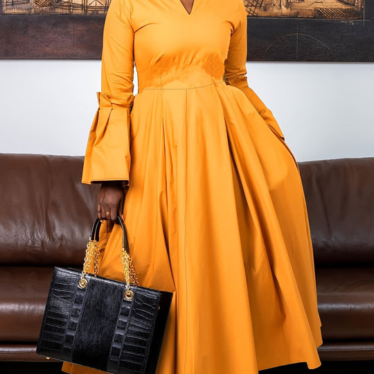 Netilda | Elegant V‑Neck Flare‑Sleeve Dress